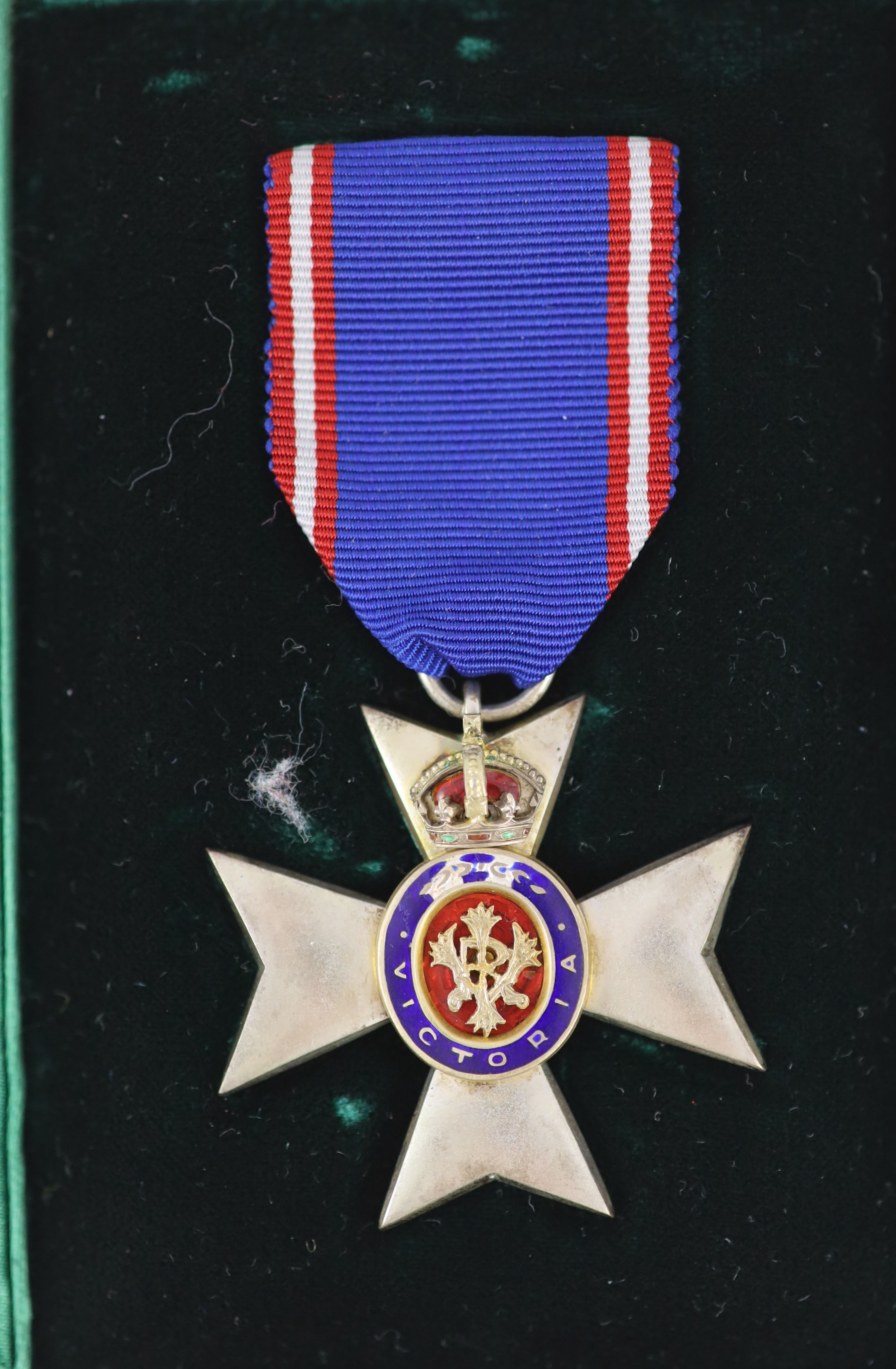 A group medals awarded to Alan Maxwell, including, the Royal Victorian Order, 5th Class, cased, the Queen Elizabeth II Silver Jubilee Medal, cased, together with a framed citation, and three WW2 General Service Medals an